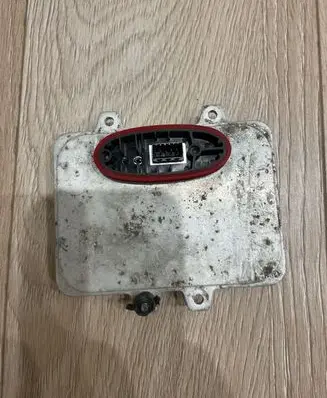 Volkswagen Touareg I Headlight ballast module Xenon