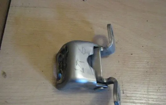 Rear door upper hinge