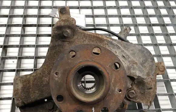 Front wheel hub spindle knuckle