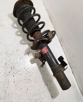 Front shock absorber with coil spring