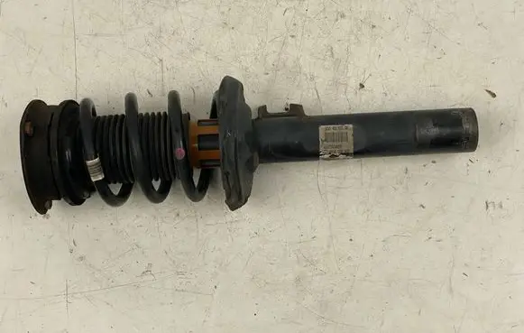 Front shock absorber with coil spring
