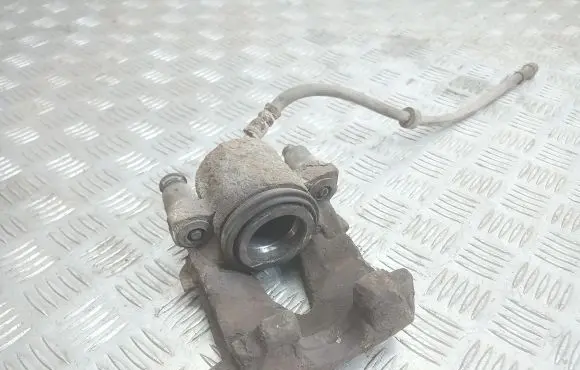 Volkswagen Golf IV Front brake caliper