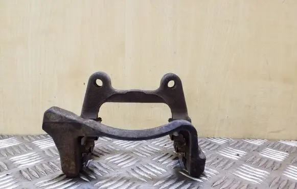 Volkswagen PASSAT B7 Brake caliper pad carrier rear 