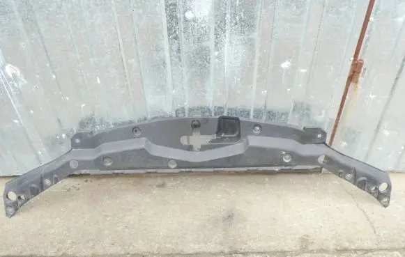 Engine bonnet/hood lock trim molding