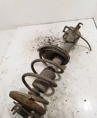Mitsubishi Lancer X Front shock absorber with coil spring