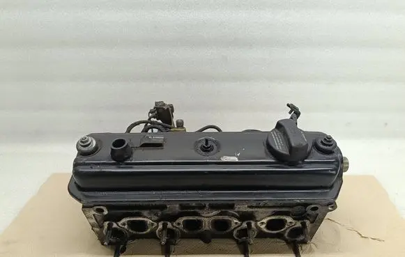 Volkswagen Golf III Engine head 028103373N