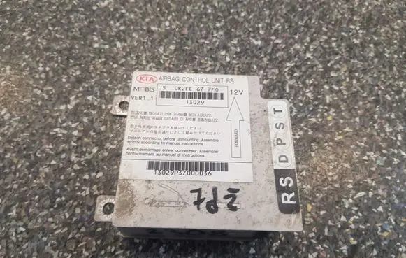 Mitsubishi Colt Airbag control unit/module 0K2FE677F0