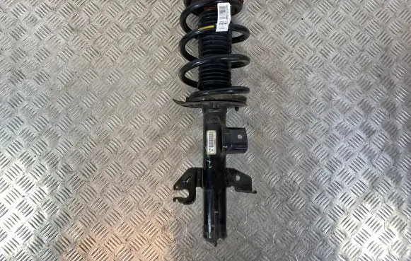 Jeep Cherokee Front shock absorber with coil spring 68373956AC
