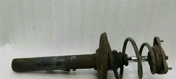 Porsche Boxster 987 Front shock absorber with coil spring 98734304200