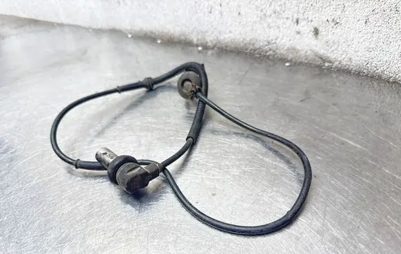 Volkswagen PASSAT B5 ABS brake wheel speed sensor 8D0927803