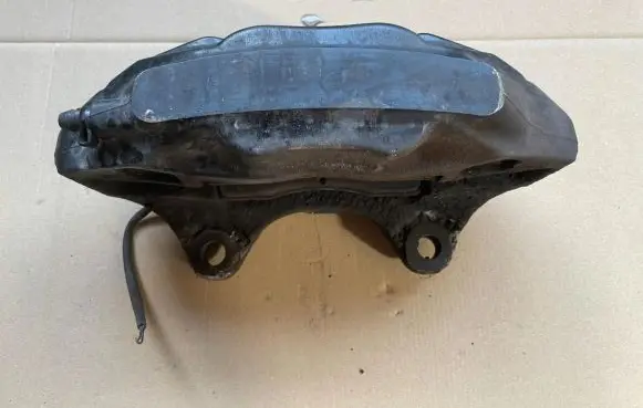 Volkswagen Touareg II Front brake caliper