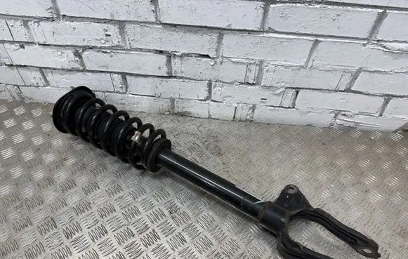 Front shock absorber with coil spring
