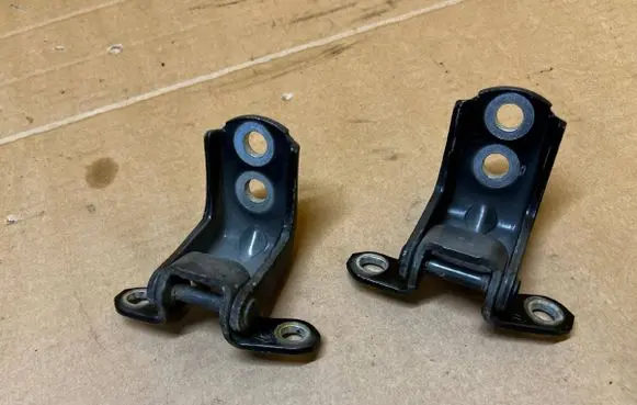 Front door hinge set