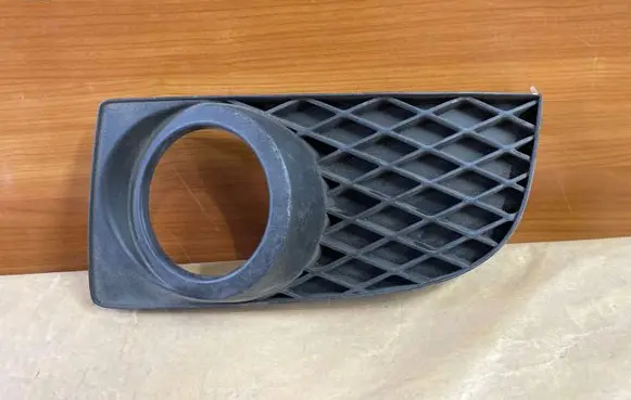 Mazda Premacy Front bumper lower grill C14650C21