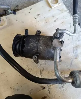 Ford Focus Air conditioning (A/C) compressor (pump) AV6119D629CA