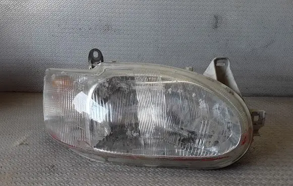 Ford Escort Headlight/headlamp 95AG13W029DD