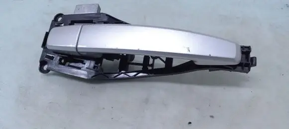 Opel Zafira B Front door exterior handle 24463524