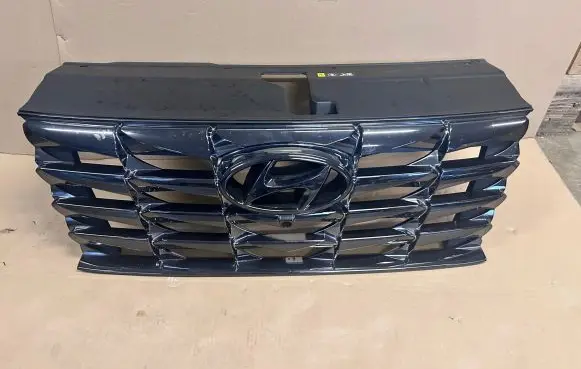 Hyundai Tucson IV NX4 Front bumper upper radiator grill