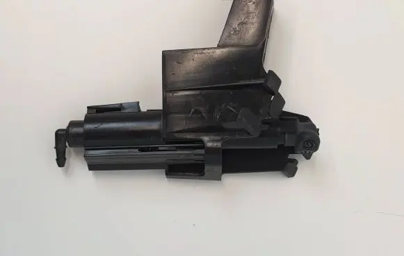 Headlight washer spray nozzle