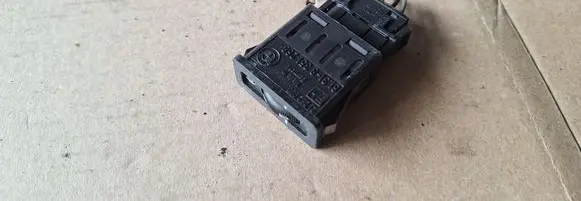 Headlight level height control switch