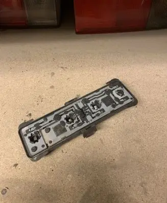 Chrysler Voyager Tail light bulb cover holder 15357500 15437000