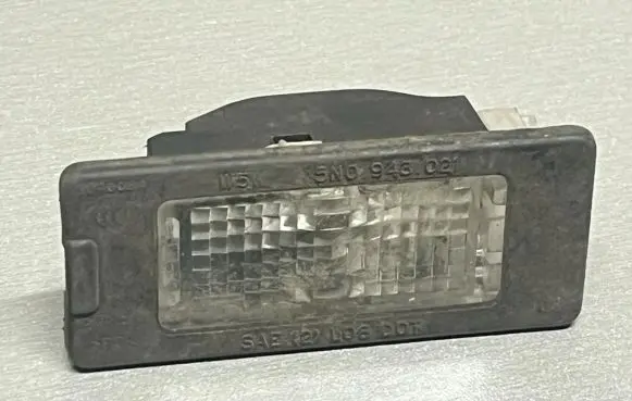 Volkswagen Golf VI Number plate light 1K9943127A