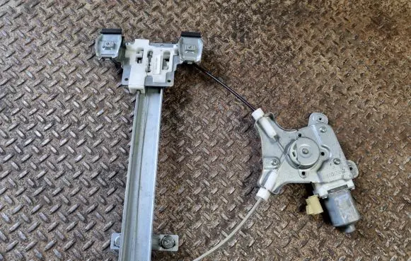 Cadillac Escalade Rear door window regulator with motor 23227001