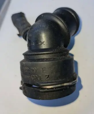 Volkswagen Touran I Engine coolant pipe/hose 600122291E