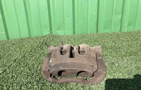 Opel Movano B Front brake caliper 410009838R