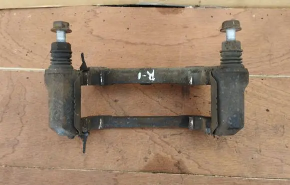 Infiniti EX Front Brake Caliper Pad/Carrier 