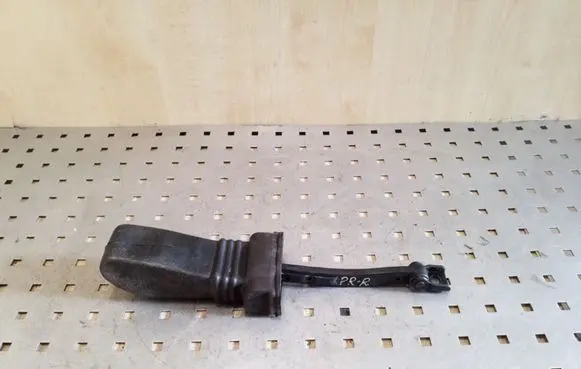 Front door check strap stopper