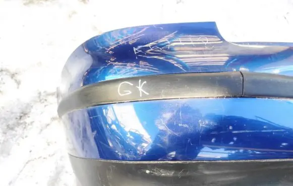 Rear bumper trim bar molding