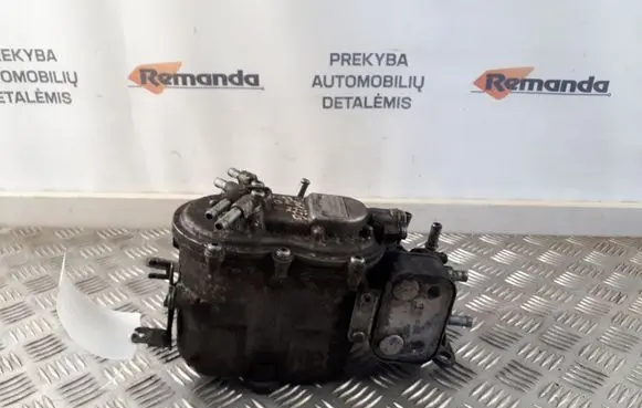 Volkswagen Touareg I Fuel filter housing 6640574100 7L6127401A