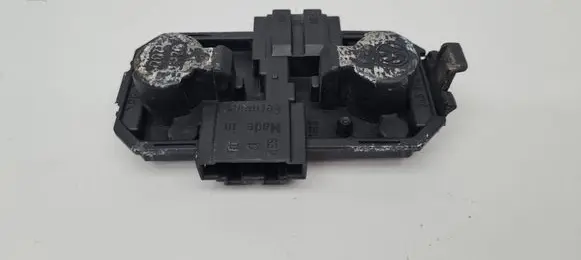 Tail light bulb cover holder