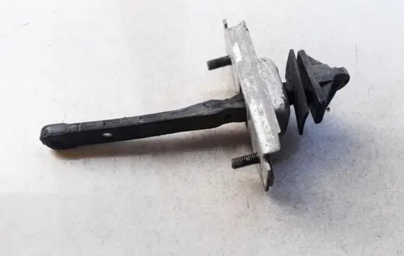 Mazda 323 F Rear door check strap stopper