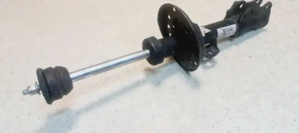Opel Corsa D Front shock absorber/damper 13240918 GP27389