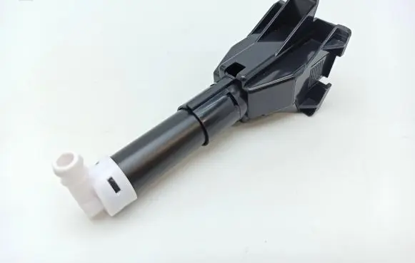 Headlight washer spray nozzle