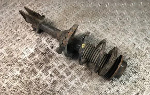Subaru Outback Front shock absorber with coil spring