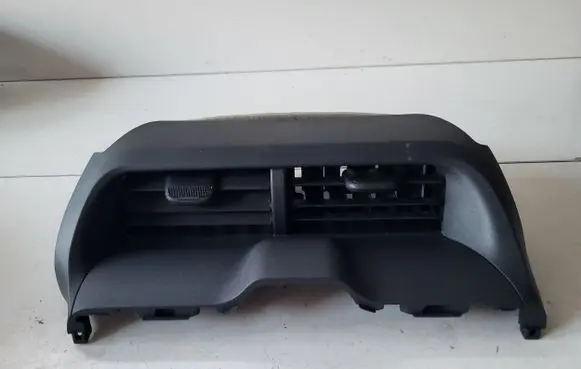 Toyota Yaris XP210 Dash center air vent grill 55670K0090