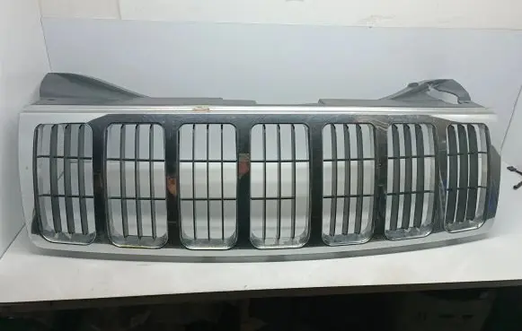 Jeep Grand Cherokee (WK) Front bumper upper radiator grill 5JF94TRMAE AM0702001 55156814AE