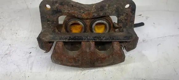 Subaru Forester SF Front brake caliper