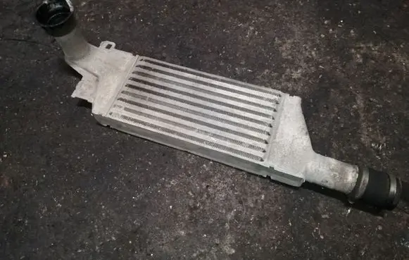 Opel Combo C Intercooler radiator 24466787