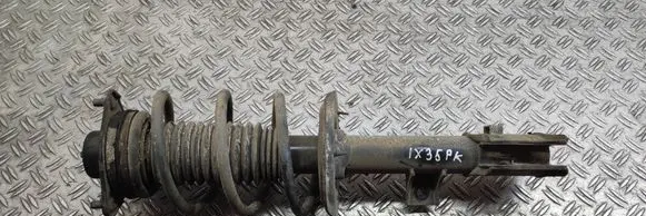 Hyundai ix35 Front shock absorber with coil spring 546512Y010