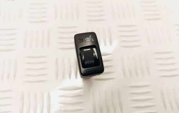 Seat heating switch