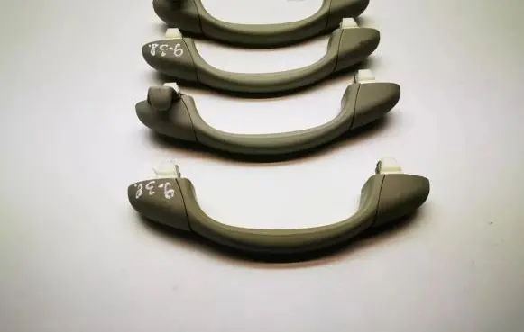 Saab 9-3 Ver2 A set of handles for the ceiling 12789490 12794034