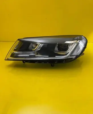 Volkswagen Touareg II Headlight/headlamp 7P1941033A