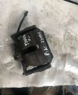 Volkswagen Touran III Front brake caliper