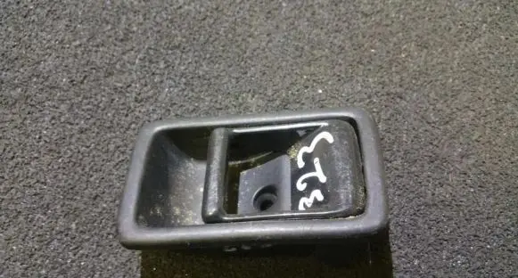 Mazda 323 Rear door interior handle