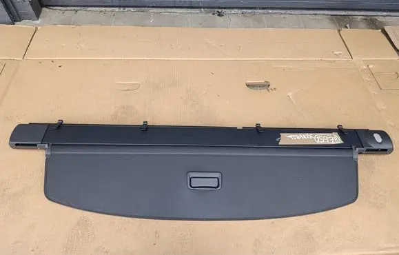 Volkswagen Touareg II Parcel shelf load cover 7P6867773