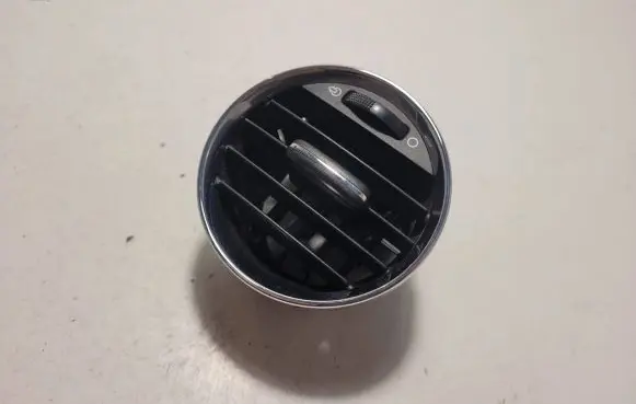 Dash center air vent grill